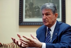 FILE - Sen. Joe Manchin, D-W.Va. is interviewed by The Associated Press in his office in Washington, Feb. 1, 2017.
