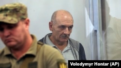 UKRAINE -- Volodymyr Tsemakh, former commander of Russian-backed separatist forces in eastern Ukraine, sits in a court room in Kyiv, Ukraine, Thursday Sept. 5, 2019.