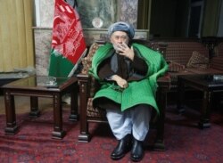 FILE - Ahmad Ishchi, who is reported to have been beaten and detained by AfghanistanÕs vice president Abdul Rashid Dostum, speaks during an interview at his home in Kabul, Afghanistan, Dec. 13, 2016.
