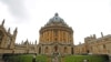 FILE - A man walks in front of the buildings of Oxford University, amid the spread of the coronavirus disease (COVID-19) in Oxford, Britain, Oct. 6, 2020.