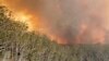 Forêt en feu autour du lac Conjola, en Australie, le 2 janvier 2020. (AP)