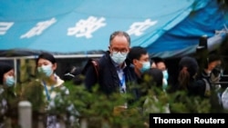 세계보건기구(WHO) 조사단이 29일 중국 허베이성 우한의 한 병원에 도착했다.