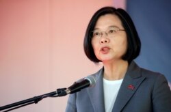 FILE - Taiwan's President Tsai Ing-wen speaks during her visit in Port-au-Prince, Haiti, July 13, 2019.