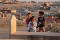Officials are still searching for more than 2,900 Yazidi men, women and children who they believe to be alive after being captured by IS, pictured in Khanke, Kurdistan region, Iraq, Sept. 29, 2019. (Heather Murdock/VOA)