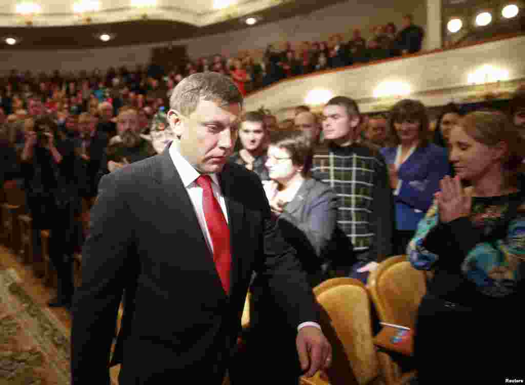 Pro-Russian rebel leader Alexander Zakharchenko arrives for the inauguration ceremony, Donetsk, eastern Ukraine, Nov. 4, 2014. 
