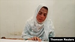 Rani Khan reads the Koran at Pakistan's first transgender only madrassah or a religious school, in Islamabad, March 22, 2021.
