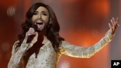 Singer Conchita Wurst from Austria performs the song "Rise Like a Phoenix" during a rehearsal for the Eurovision Song Contest in Copenhagen, Denmark, May 7, 2014.