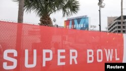 Super Bowl LV signage surrounds Raymond James Stadium ahead of the weekend's Super Bowl LV between the Kansas City Chiefs and Tampa Bay Buccaneers in Tampa, Fla., Feb. 6, 2021. 