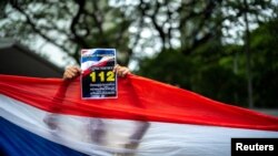 Pro-royalist activists during a rally in front of the U.S. embassy in Bangkok