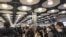 FILE - People queue at terminal 5 of Heathrow Airport, in London, Britain, Jan. 22, 2021, in this image obtained from social media. (Pia Josephson/via Reuters)