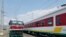 FILE - In this photo of Saturday, Sept.24, 2016, locomotives for the new Ethiopia to Djibouti electric railway system queue outside a train station in the outskirts of Addis Ababa. One of Africa's best-performing economies on Wednesday launched its latest massive infrastructure project, a railway linking the landlocked country with a major port on the Gulf of Aden. But it came just days after dozens were killed in anti-government protests in the region the railway runs through. 