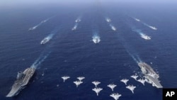 ກໍ່າປັ່ນບັນທຸກເຮືອບີນນິວເຄລຍຂອງຈີນພວມຊ້ອມລົບ