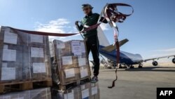 የተባበሩት መንግሥታት የዓለም ጤና ድርጅት ከተባበሩት አረብ ኤምሬትስ አውሮፕላን በግብፅ ኤል-አሪሽ አውሮፕላን ማረፊያ እአአ ጥር 24 ቀን 2025