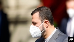 Iran's Governor to the International Atomic Energy Agency, IAEA, Kazem Gharib Abadi leaves the 'Grand Hotel Vienna' where closed-door nuclear talks take place in Vienna, Austria, April 20, 2021. 