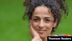 مسیح علینژاد، روزنامه‌نگار و فعال حقوق بشر.