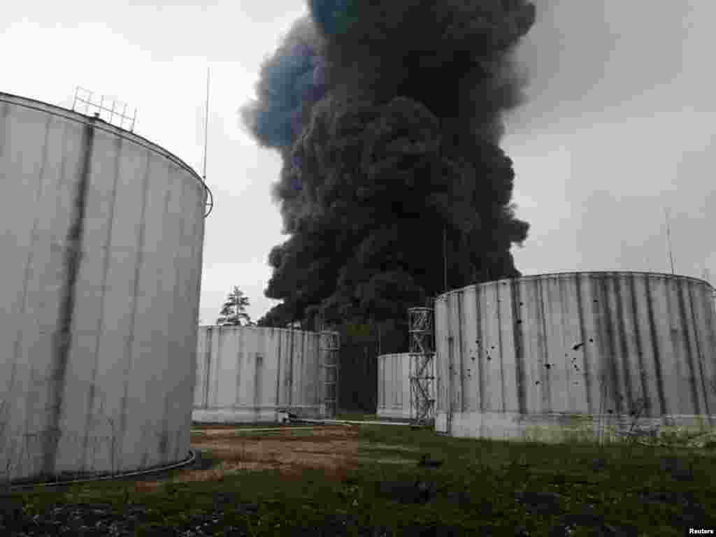 Smoke rises from the oil depot, which, according to local authorities, was damaged by shelling in Chernihiv, Ukraine, in this handout picture released on March 3, 2022. (Credit:&nbsp;Press service of the Ukrainian State Emergency Service)