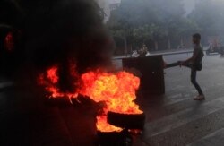Saad Hariri's supporters block streets in Beirut, Lebanon, July 15, 2021.