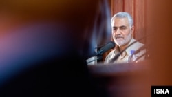 FILE - Qassem Soleimani, the IRGC commander who is overseeing Iran's military operations in Syria and Iraq against Islamist militants, is shown in a conference in Qom, Iran, May 23, 2016. The main Iranian commander in an animated film opening soon in Iran has been intentionally depicted as Soleimani.