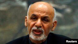 FILE - Afghanistan's President Ashraf Ghani speaks to the media during an event in Kabul, Dec. 10, 2014.
