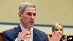 FILE - Ken Cuccinelli, acting director of U.S. Citizenship and Immigration Services, testifies during a House Oversight subcommittee hearing on deportation of critically ill children, Oct. 30, 2019.