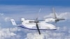 A screenshot shows an image of the Lanying R6000, a 6-ton tiltrotor unmanned aerial vehicle, from the United Aircraft website. The company website describes the R6000 drone as a "car in the sky" that can seat up to 12 people.