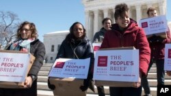 Members of the Human Rights Campaign deliver "People's Brief" with more than 200,000 signatures in support of marriage equality to the Supreme Court in Washington, March 6, 2015.