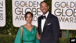 Jada Pinkett Smith and her husband, Will Smith, arrive at the 73rd annual Golden Globe Awards at the Beverly Hilton Hotel in Beverly Hills, Calif., Jan. 10, 2016. Pinkett Smith said she would boycott this year’s Oscars to protest the lack of diversity amo