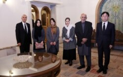 Afghanistan's President Ashraf Ghani meets with family of Japanese Dr. Tetsu Nakamura, in Kabul, Afghanistan, Dec. 6, 2019, in the Afghan Presidential Palace.