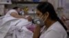 India’s Daily COVID Count Climbs Toward 400,000