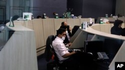 کارکنان تالار جدید بورس تهران