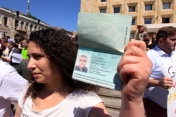 FILE - Leyla Mustafayeva, wife of Azerbaijani journalist Afgan Mukhtarli, attends a rally in Tbilisi, Georgia, May 31, 2017.
