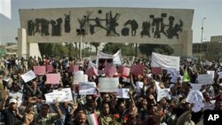 Protesters chant anti-government slogans during a demonstration in Baghdad, Iraq, March 4, 2011