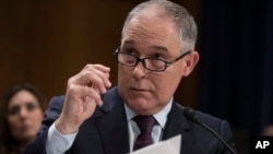 FILE - Scott Pruitt testifies on Capitol Hill in Washington at the hearing to confirm his nomination as Environmental Protection Agency administrator, Jan. 18, 2017.