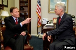 FILE - U.S. Supreme Court nominee Judge Neil Gorsuch, right, meets with Senator Richard Blumenthal, a Connecticut Democrat, on Capitol Hill in Washington, Feb. 8, 2017.