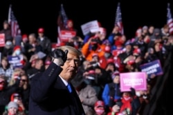 FILE - U.S. President Donald Trump departs at the end of a campaign event at Eppley Airfield in Omaha, Nebraska, Oct. 27, 2020.