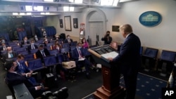 President Donald Trump speaks during a news conference at the White House, July 22, 2020, in Washington.