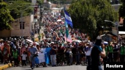 Karavan ribuan migran Honduras ketika sampai di kota Tapachula, Mexico dalam perjalanan menuju AS. 