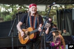 FILE - Country music legend Willie Nelson performs at the 30th Annual Bridge School Benefit Concert in Mountain View, California, Oct. 23, 2016.