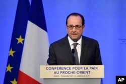 French President Francois Hollande delivers his speech at the opening of the Mideast peace conference in Paris, Sunday, Jan. 15, 2017.
