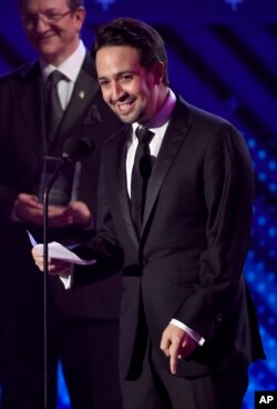 Lin-Manuel Miranda accepts the Latin Recording Academy president's merit award at the 18th annual Latin Grammy Awards at the MGM Grand Garden Arena, Nov. 16, 2017, in Las Vegas.