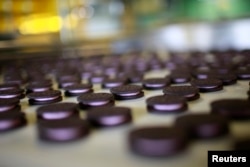 These cookies were probably cut with a cookie cutter at a cookie factory. So, they look all the same, or cookie-cutter!