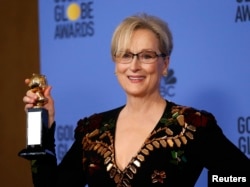 FILE - Meryl Streep holds the Cecil B. DeMille Award during the 74th Annual Golden Globe Awards in Beverly Hills, California, Jan. 8, 2017.