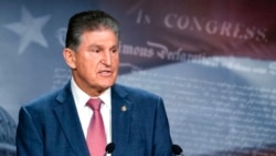 Sen. Joe Manchin, D-W.Va., speaks with reporters during a news conference on Capitol Hill, Nov. 1, 2021.