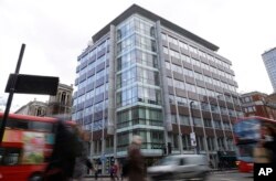 FILE - A general view of the building at 55 New Oxford Street that contains offices of Cambridge Analytica in London, March 23, 2018.