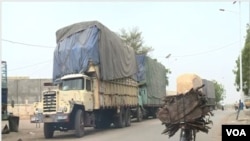 Trucks transporting goods are at a standstill in Kousseri, a town on Cameroon’s northern border with Chad, Apr. 25, 2021. (Moki Edwin Kindzeka/VOA)