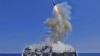 The Arleigh Burke-class guided-missile destroyer USS Barry launches a Tomahawk cruise missile from the ships bow, off the Libyan coast, March 2011. (file)