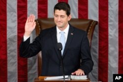 Newly elected House Speaker Paul Ryan of Wisconsin takes the oath of office in the House Chamber on Capitol Hill in Washington, Oct. 29, 2015.