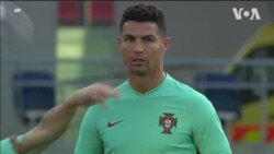 Ronaldo yana atisaye da abokanan wasansa na Portugal gabanin karawar da za su yi da Faransa