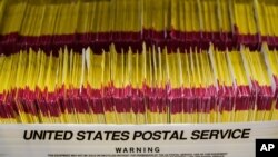 Returned ballots are shown at elections management center at the Salt Lake County Government Center, Oct. 21, 2020, in Salt Lake City. (AP)
