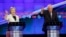 Democratic presidential candidates Sen. Bernie Sanders, I-Vt., right, and former Secretary of State Hillary Clinton speak during CNN Democratic Presidential Primary Debate at the Brooklyn Navy Yard, April 14, 2016.